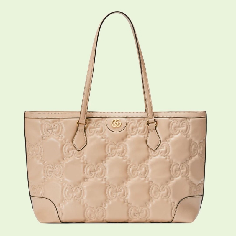 G*u*i shopping bags